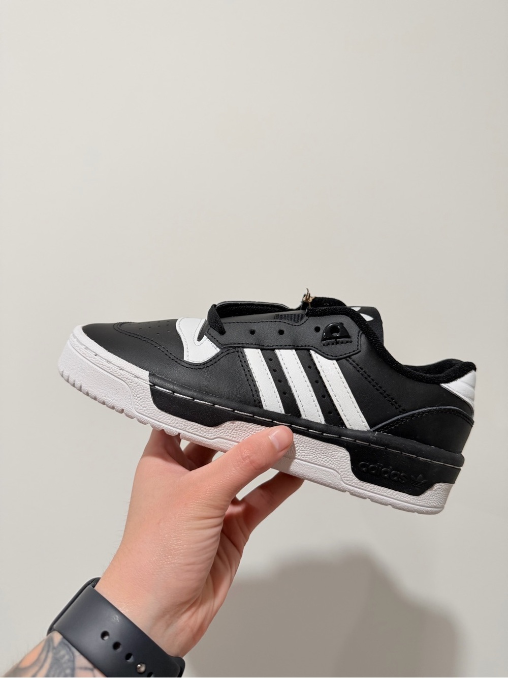 adidas Kids Black and White Low-Top Sneakers with Signature Stripes